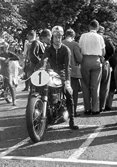 Norton Prints: Kiwi Gordon Laing (Norton) preparing to start the 1954 Junior TT
