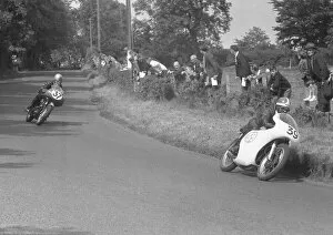 Images Dated 17th December 2021: Len Ireland (Norton) and Alf McCall (BSA) 1959 Junior Ulster Grand Prix