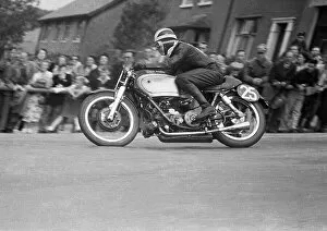 Images Dated 14th April 2023: Bill Lomas (AJS Porcupine) on Bray Hill, 1952 Senior TT