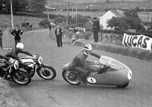 Bill Lomas Collection: Bill Lomas (Guzzi) and John Hartle (Norton, 11) 1956 Junior Ulster Grand Prix