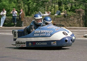 Images Dated 24th July 2011: Lowry Burton leaves Governors Bridge: 1986 Sidecar Race A