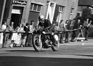 Images Dated 11th December 2017: M Wassell (AJS) 1957 Junior Manx Grand Prix