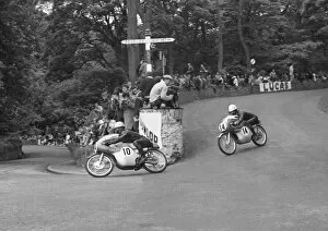 Images Dated 7th January 2022: Michio Ichino (Suzuki) and Isao Morishta (Suzuki) 1963 50cc TT