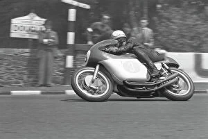 Images Dated 3rd August 2011: Mike Hailwood at Quarter Bridge: 1962 Junior TT