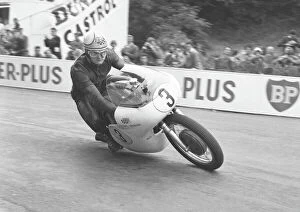 Images Dated 3rd August 2011: Mike Hailwood winning the 1961 Senior TT
