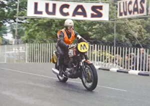 Images Dated 18th April 2022: Mike Kelly (Triumph Travelling marshal) 1971 Manx Grand Prix