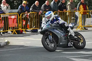 Murray McConnachie (Triumph) 2014 Junior Manx Grand Prix