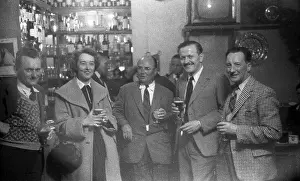Norton tuner Steve Lancefield (centre) and Veloce's Bertie Goodman to his left, Nursery Hotel, 1957 TT