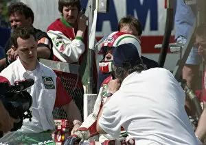 Pit stop action for Philip McCallen (Honda) 1993 Formula One TT