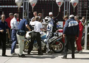 Images Dated 20th September 2019: Pit stop action for Robert Dunlop (Oxford Ducati) 1993 Formula One TT