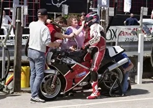 Pit stop action for Steve Ward (Honda) 1993 Formula One TT