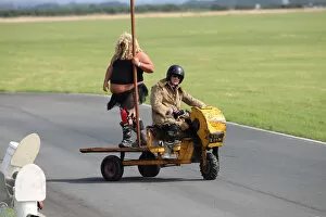 Images Dated 25th August 2019: Pole Dancing - Purple Helmet Style! 2019 Jurby Day