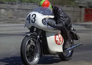 Triumph Gallery: Ray Knight (Triumph) on Glencrutchery Road 1969 Production TT