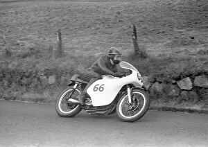 Images Dated 18th December 2021: Ronnie McBrinn (Norton) 1958 Junior Ulster Grand Prix