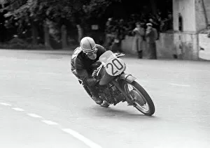 Images Dated 14th April 2023: Syd Lawton (Guzzi) at Braddan Bridge, 1952 Lightweight TT