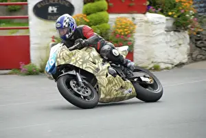 Tim Carrington (Triumph) 2009 Junior Manx Grand Prix